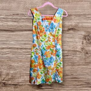 Vintage Flutterbye 1960s floral dress cream with orange piping. Small